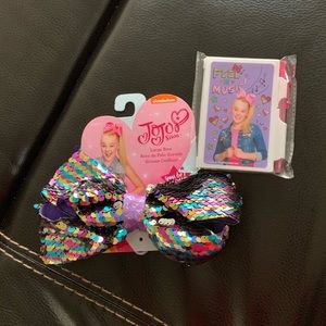 Jojo Bow and small notebook with pen
